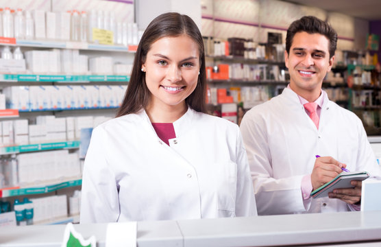 Two Pharmacists In Modern Pharmacy