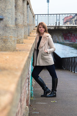 Beautiful girl posing in an urban context