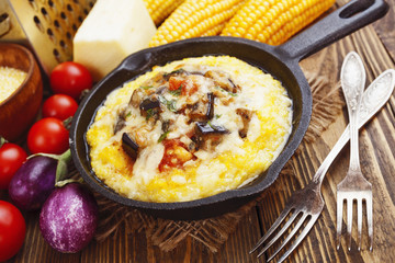 Polenta baked with vegetables and cheese