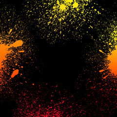 Colorful yellow, orange and red grungy gradient paint splashes on black background