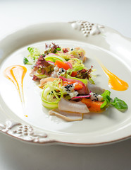 Salad with turkey fillet with baked pumpkin and ricotta truffle sauce 