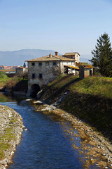 Obraz premium Toscana,casolare sul fiume