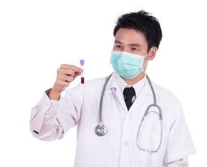 doctor in mask research a medical test glass with blood