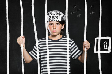 Prank boy in jail - obrazy, fototapety, plakaty