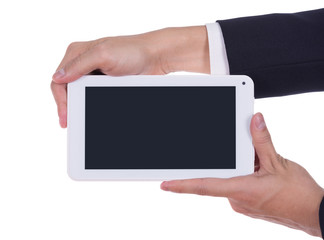 business hand holding a small tablet touch computer