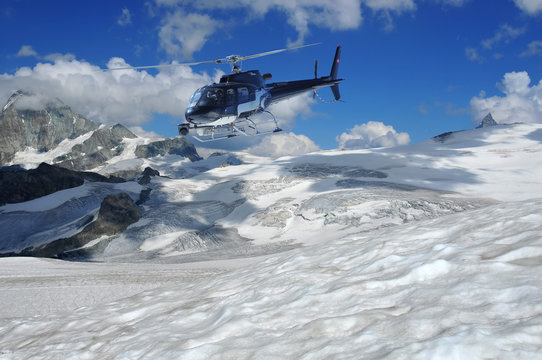 helicopter filming glaciers and the summit of the matterhorn