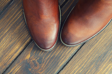 Brown  Shoes on a Wooden Background