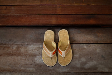 Japanese Sandals in front of a Japanese House