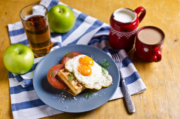 Waffles with sausage and eggs