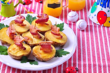 Fresh tangerines in a wooden plate on old wooden background