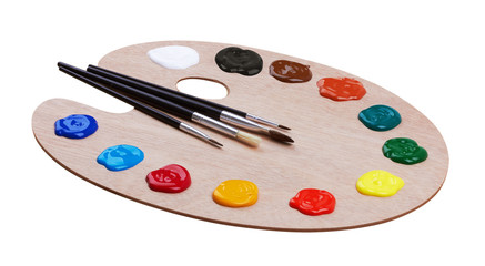Wooden art palette with paints and brushes