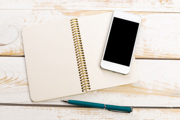 Opened notebook and other office equipment