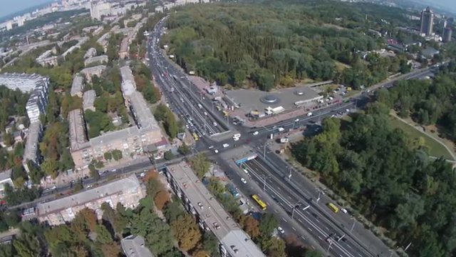 This is a highway in Kiev, Ukraine. The road passes by residential area 'Syrets' and metro station. In the left part of this frame you can see "Babi Yar" 