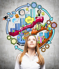 A young lady is looking up and thinking about development of business city project. A colourful...