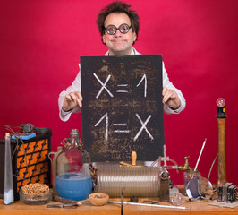 Professor in the laboratory shows a blackboard with mathematical formula