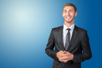 Young handsome businessman smiling