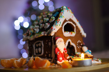 gingerbread house and Santa