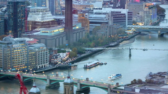 City of London panorama. River Thames, bridges and transport on the roads. View of Westminster side