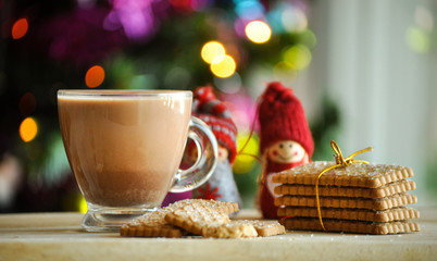 cookies and hot coffee, tea and christmas lights