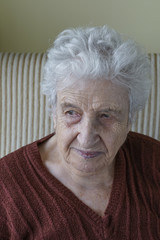 wrinkled face of senior woman