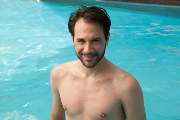 Young man relaxed in pool
