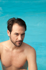 Young man relaxed in pool