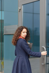 Fototapeta na wymiar Business woman with a folder in her hand