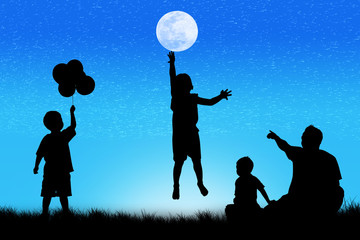 silhouette of boy happy jumping at  full moon night background