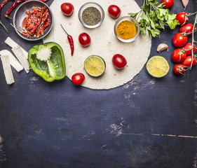 sliced vegetables on tortilla, Ingredients for cooking burritos border with text area on wooden rustic background top view horizontal
