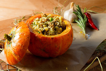 Ragout of duck with couscous, baked in a pumpkin