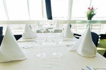 close up of table setting with glasses and cutlery