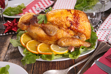 table with chicken cooked with orange