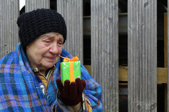 Homeless women with Christmas gift