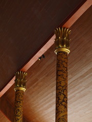 Two golden column in a temple of Thailand