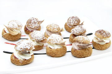 profiteroles with vanilla ice cream decorated with chocolate min