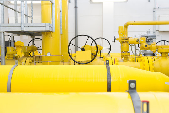 Close-up of yellow gas pipes