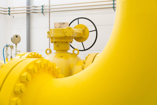 Close-up of yellow gas pipes