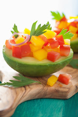 avocados stuffed with tomato pepper salad