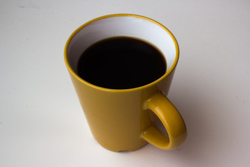 Yellow coffee cup