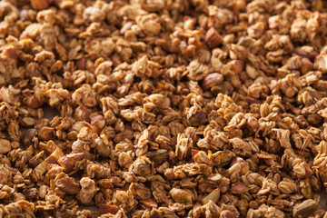 homemade healthy granola on backing paper background
