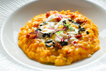 Pumpkin risotto with sun-dried tomatoes and mozzarella