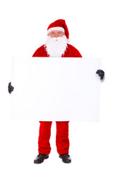 Santa Claus holding copyspace blank sign. Full length Portrait Isolated on White Background