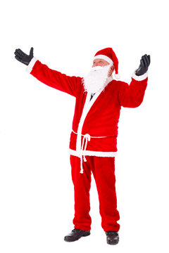 Santa Claus full length Portrait. Standing with hands open in gloved. Isolated on White Background