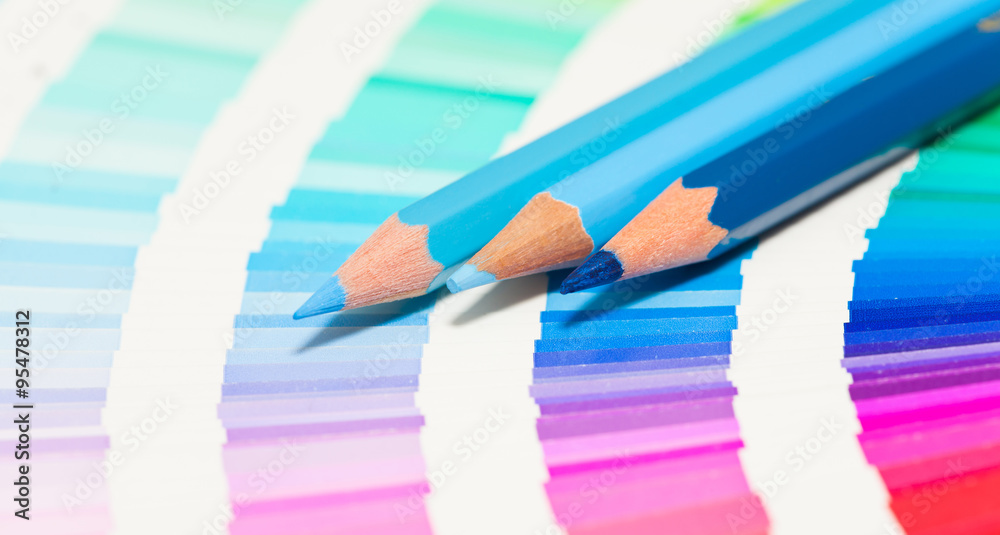 Wall mural blue colored pencils and color chart of all colors