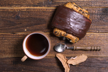Fototapeta na wymiar Coffee with chocolate bun
