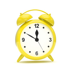 Yellow alarm clock on white