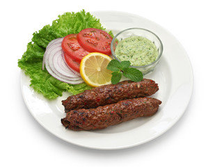 mutton seekh kabab with mint chutney isolated on white background
