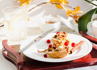 Baked pears with ricotta, walnuts, honey and cranberries