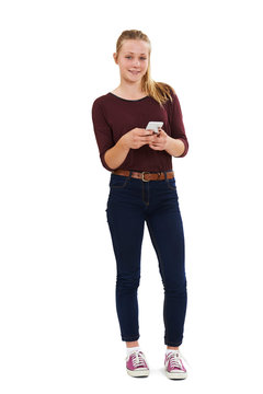 Studio Shot Of Teenage Girl Sending Text Message