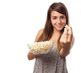 young woman with popcorns isolated on white background